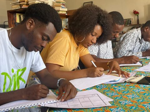 Students working together at an Aspire entrepreneurship class